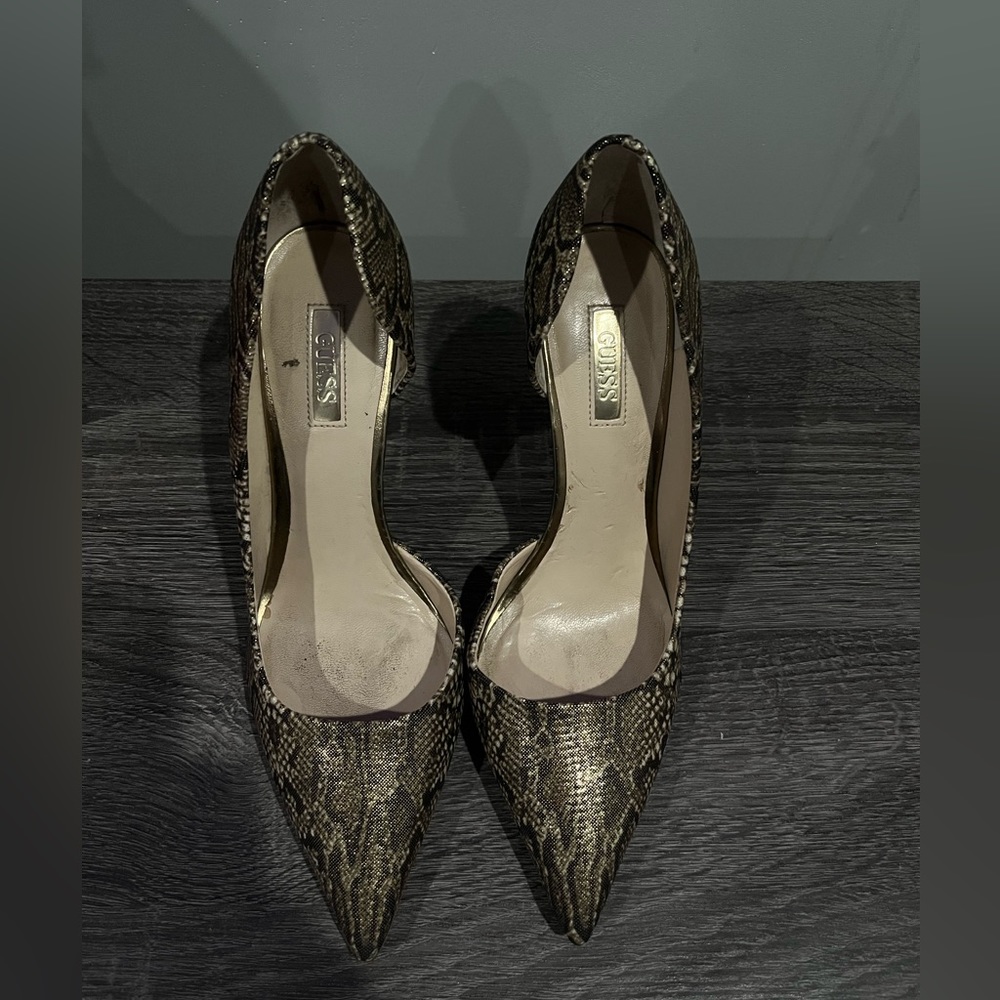 Women guess snakeskin heels